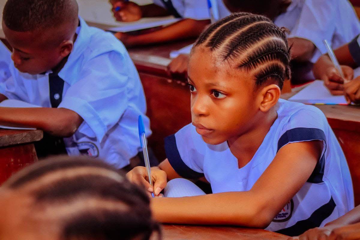 Give To Others team member engaging with students as part of the mission in Kinshasa